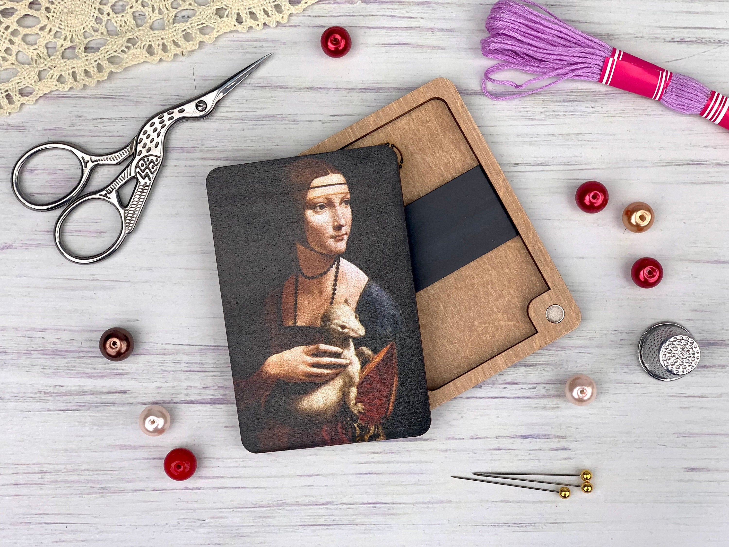 a picture of a woman with a cat on a coaster